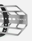 Close up of stainless steel cargo cage with Temple engraving.