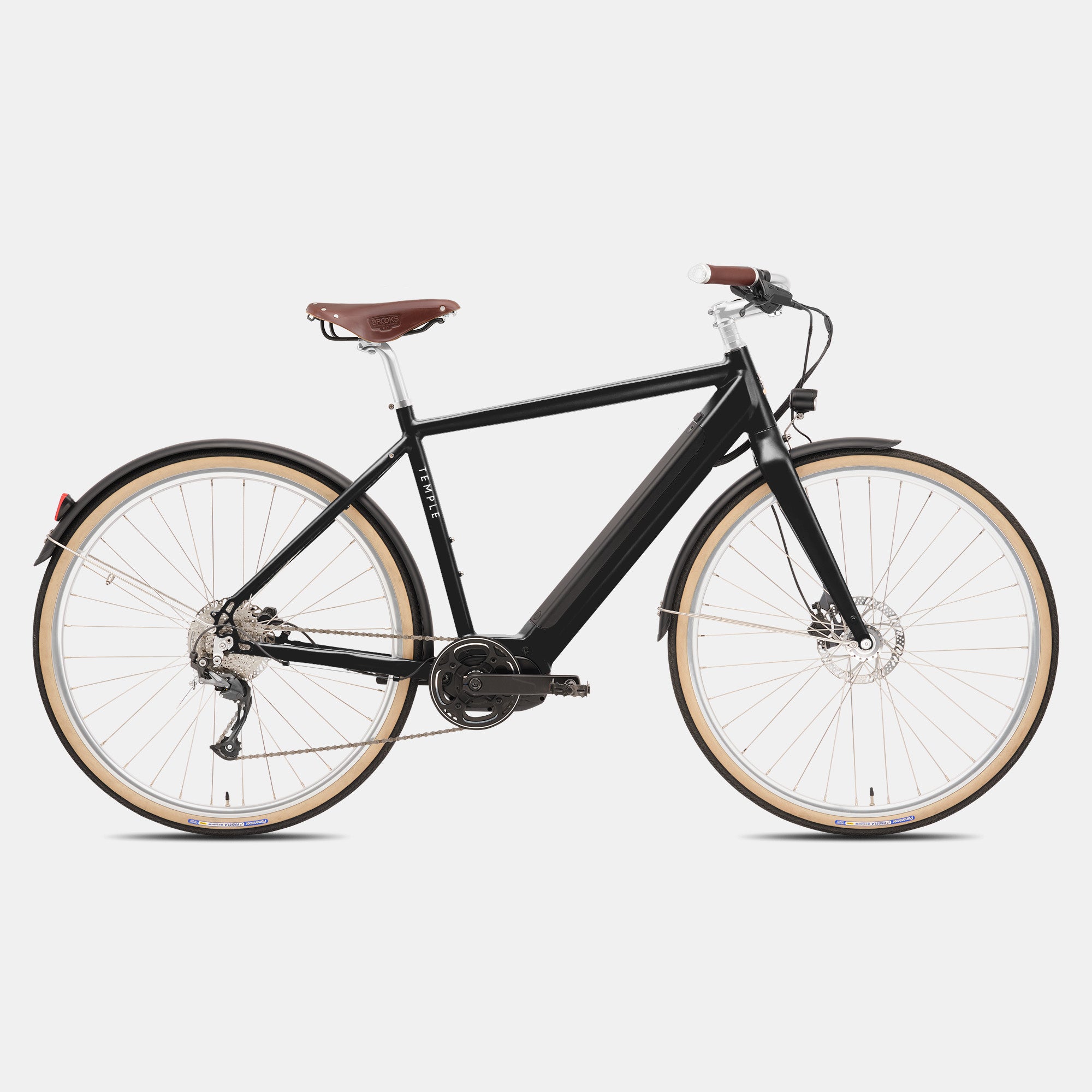 Gloss black versatile e-bike in a studio setting.