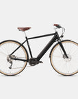 Gloss black versatile e-bike in a studio setting.