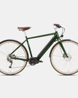 Classic adventure e-bicycle in dark green, studio setting.