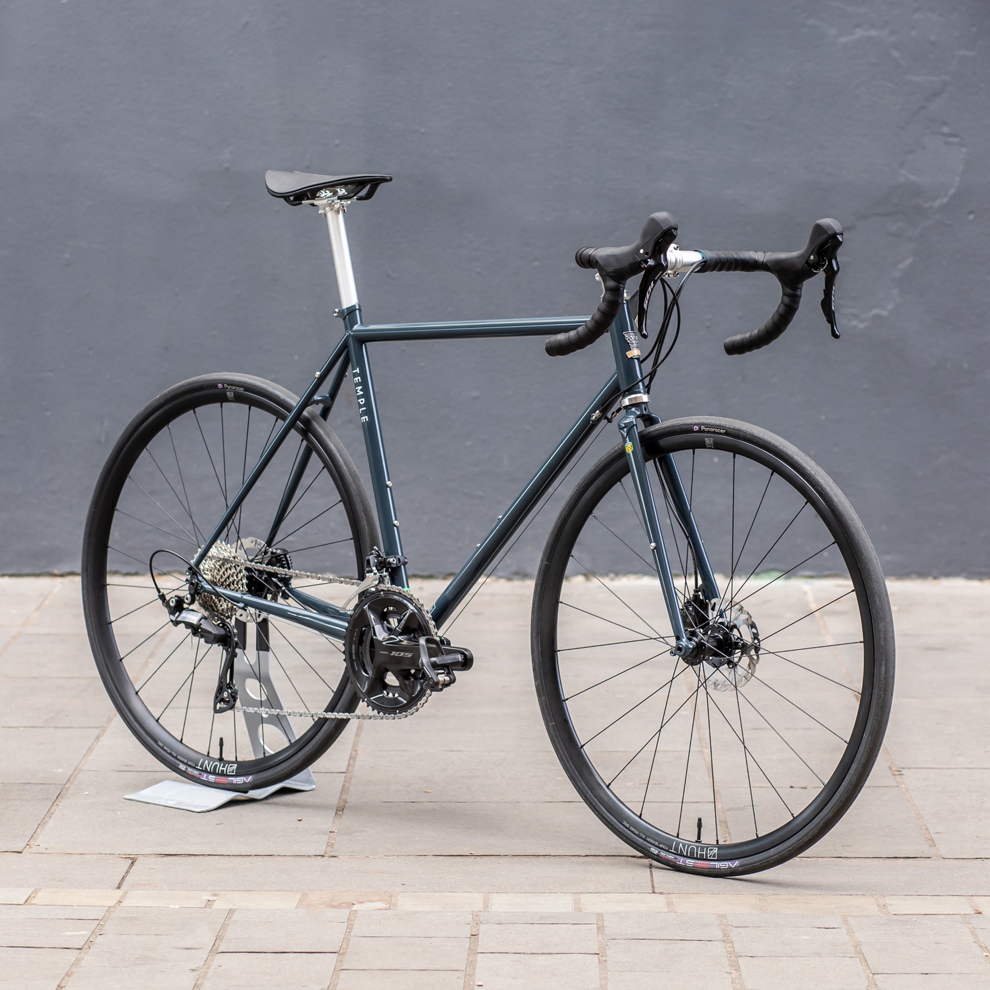 Simple, functional, Steel Road Bike in an urban setting.