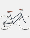Blue Step Through Lightweight steel bicycle, studio setting.