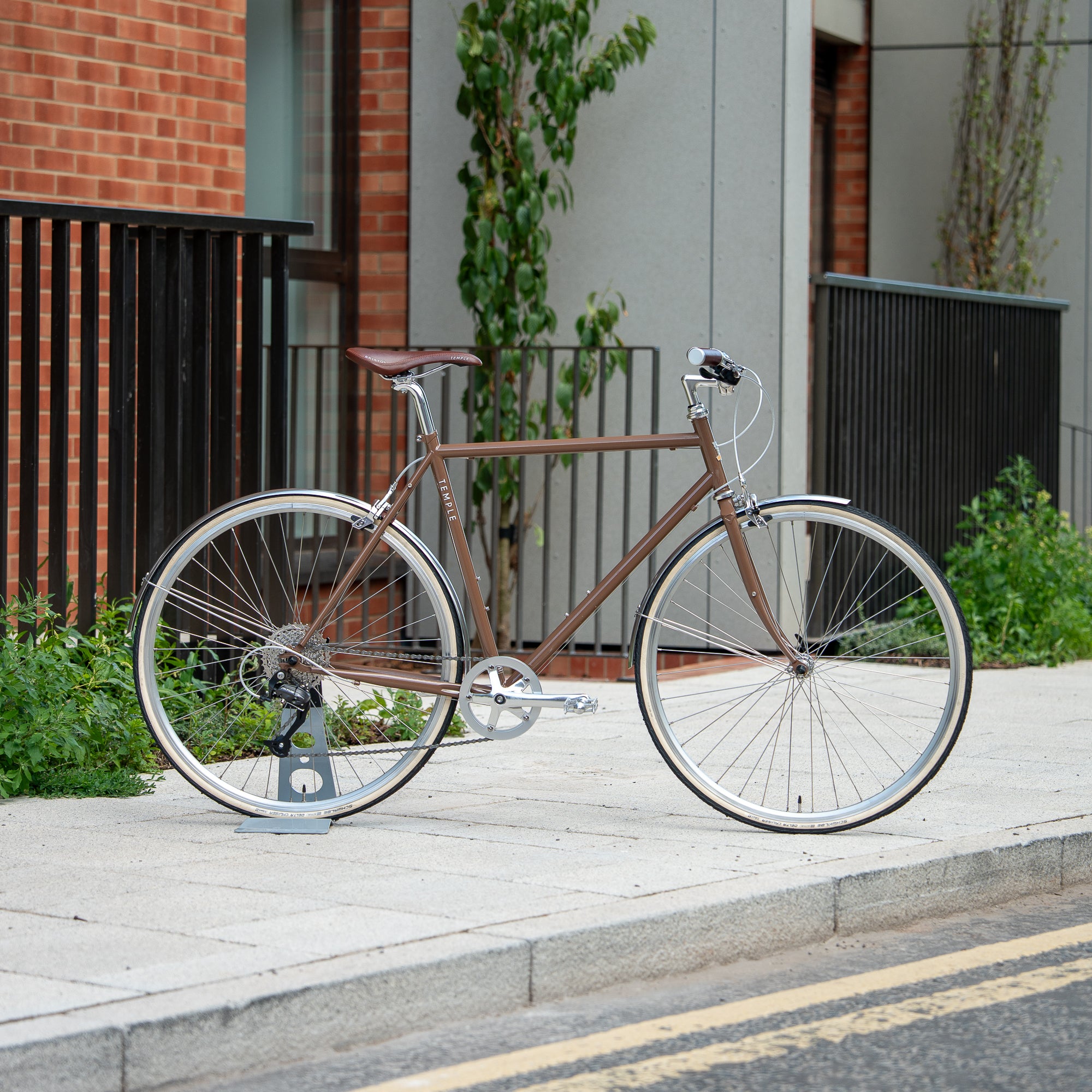 Woodland Brown Classic Lightweight bike in an urban setting.