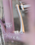 Timeless Reynolds Steel Frame on lightweight town bike in pink.