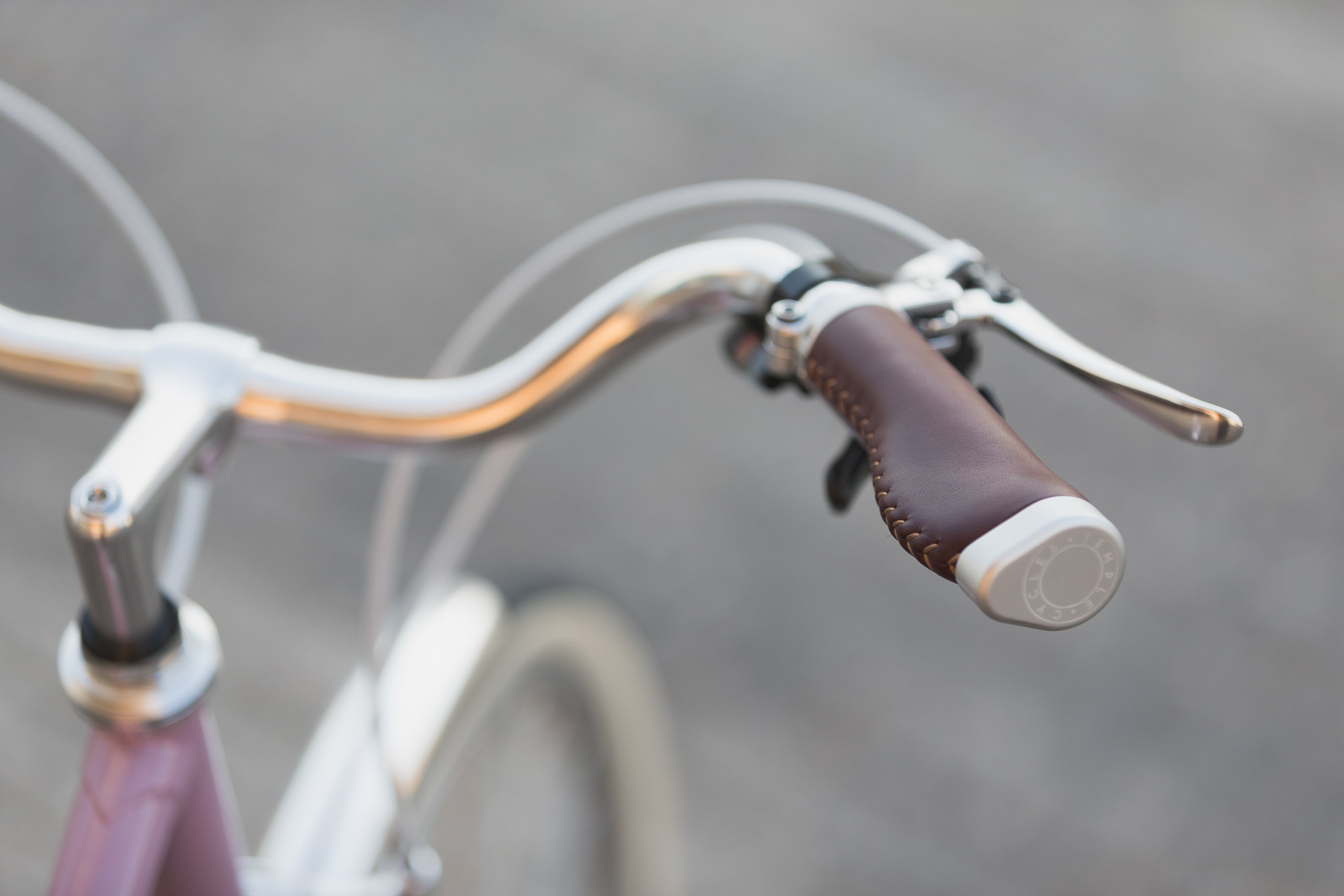 Swept back handlebars on a lightweight steel bicycle.
