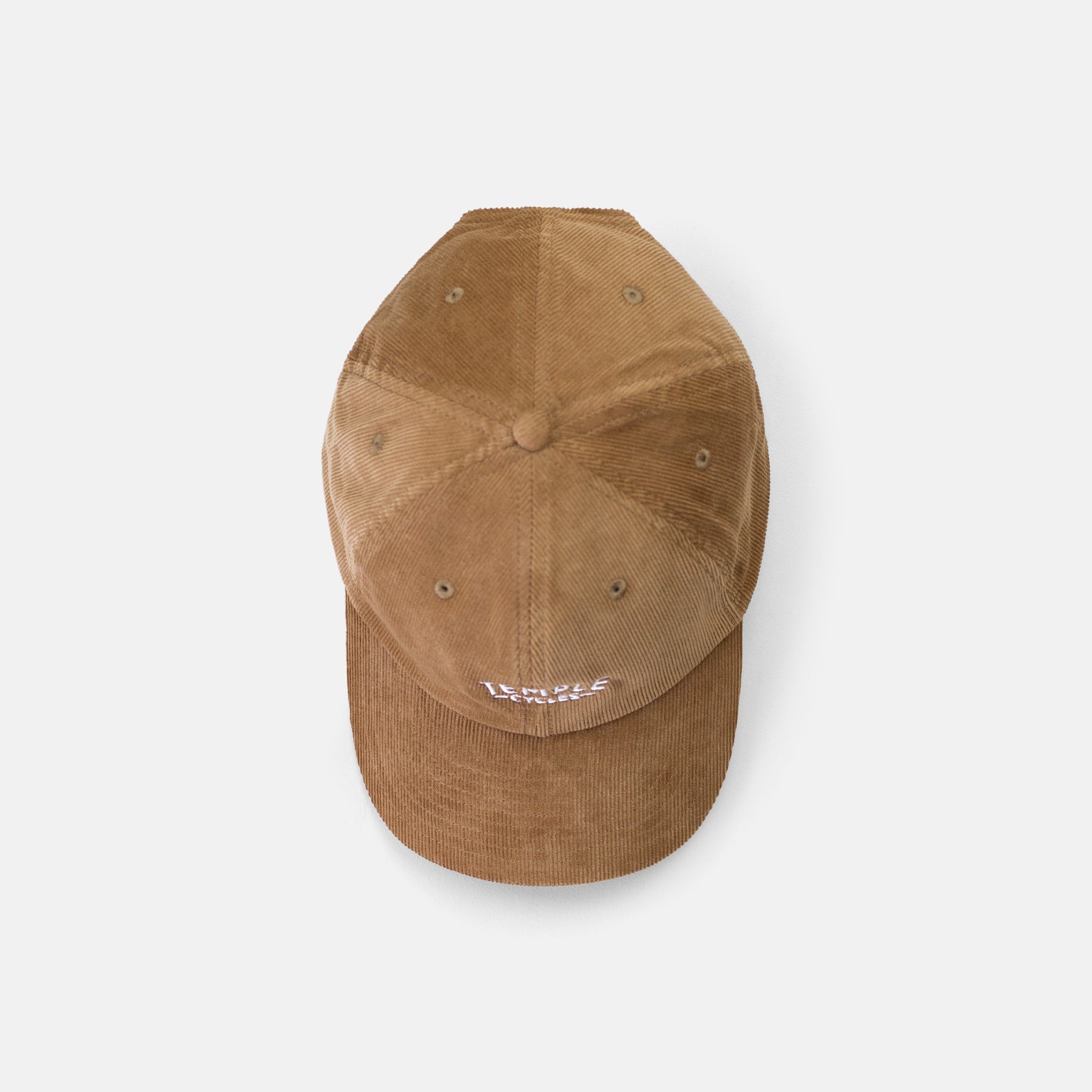 Birds Eye view of Temple unisex cap in brown corduroy, studio setting. 