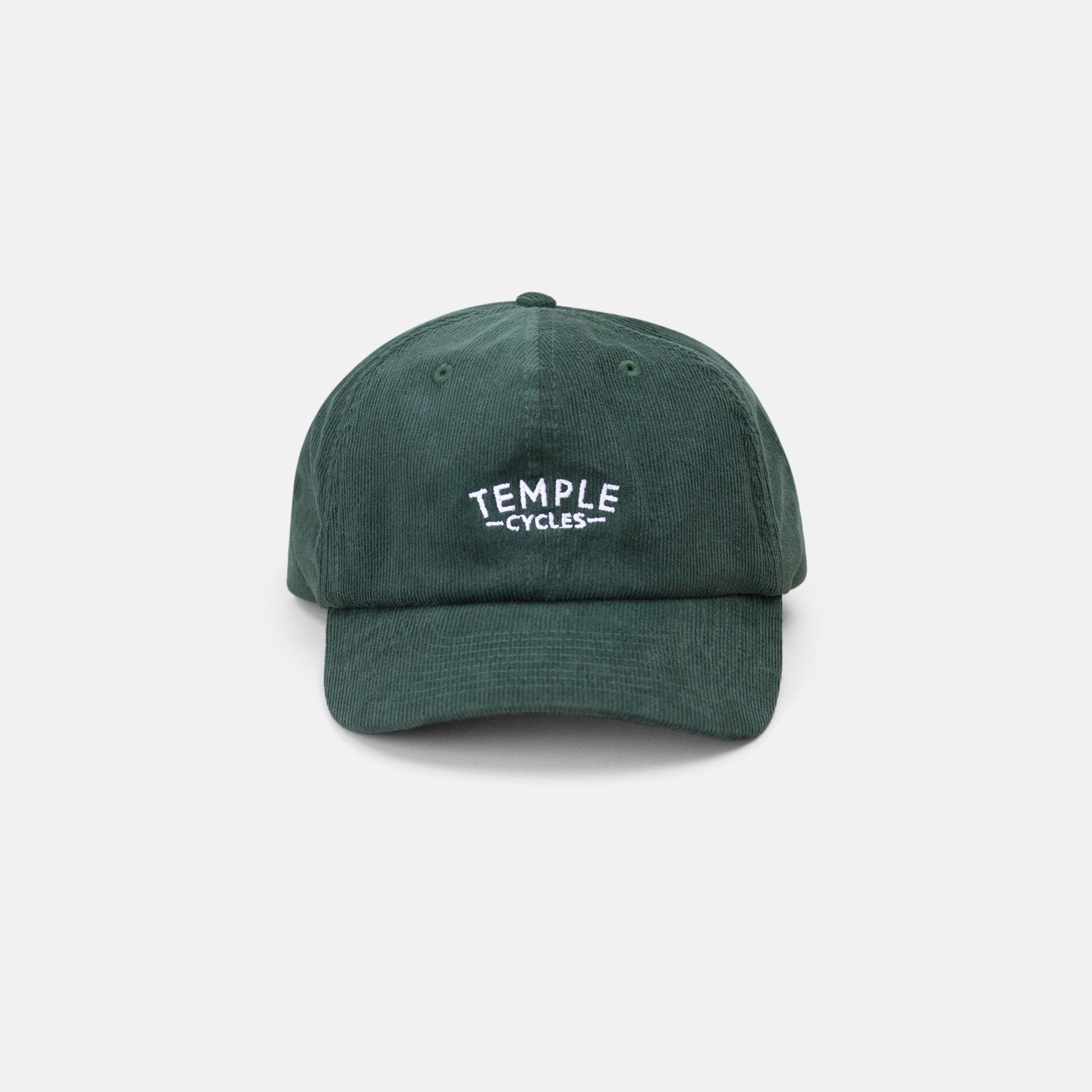 Front view of Temple Cycles embroidered cap in forest green, studio setting.