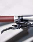 Left Shimano brake lever on a classic adventure e-bicycle.