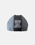 Temple Corinthian Capital logo on back of unisex cycling cap in grey, studio setting. 