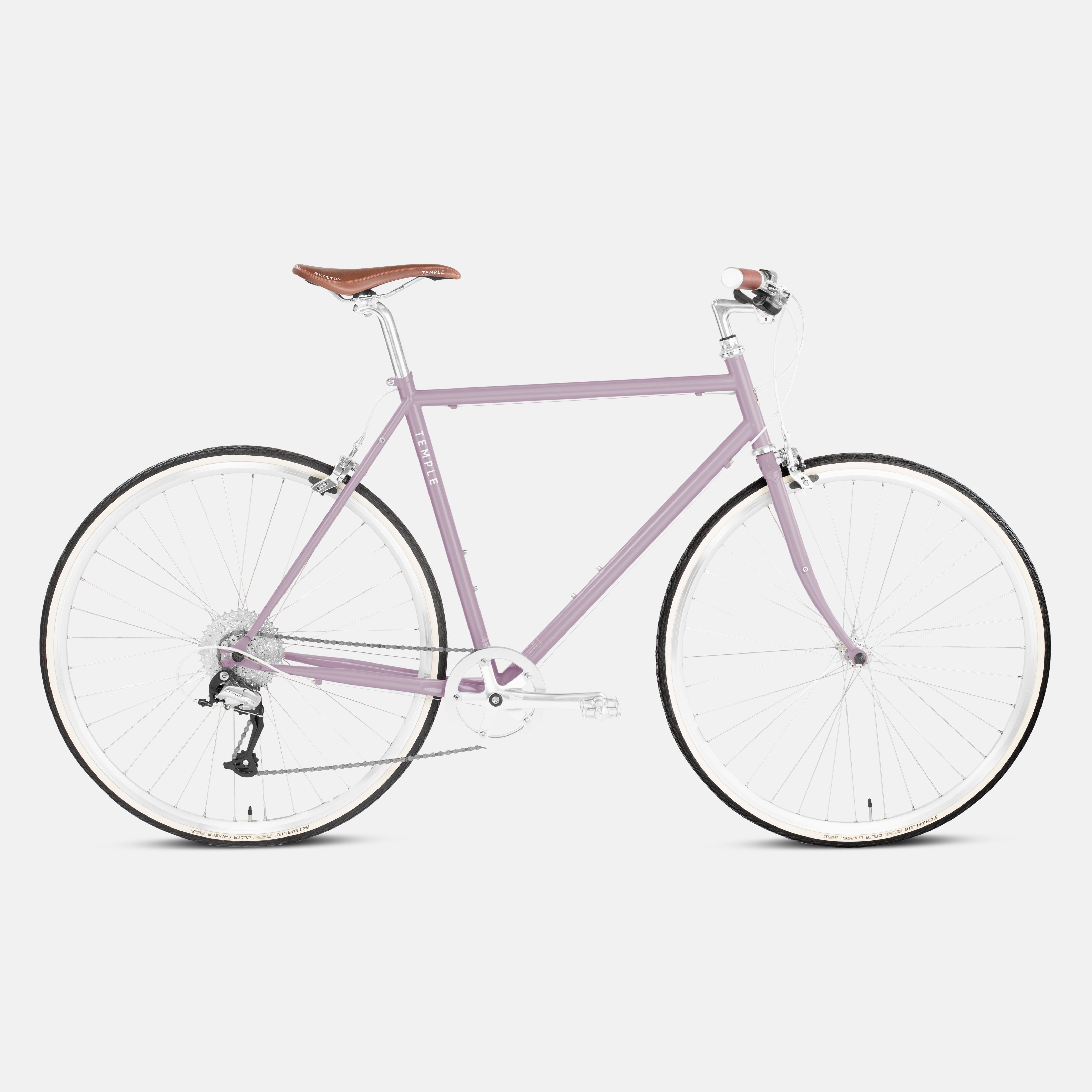 Pink classic commuter bike with a lightweight steel frame in a studio setting.