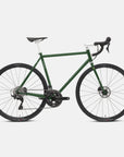 Dark green fast road bicycle, studio setting.