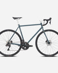 Navy versatile, durable road bicycle, studio setting.