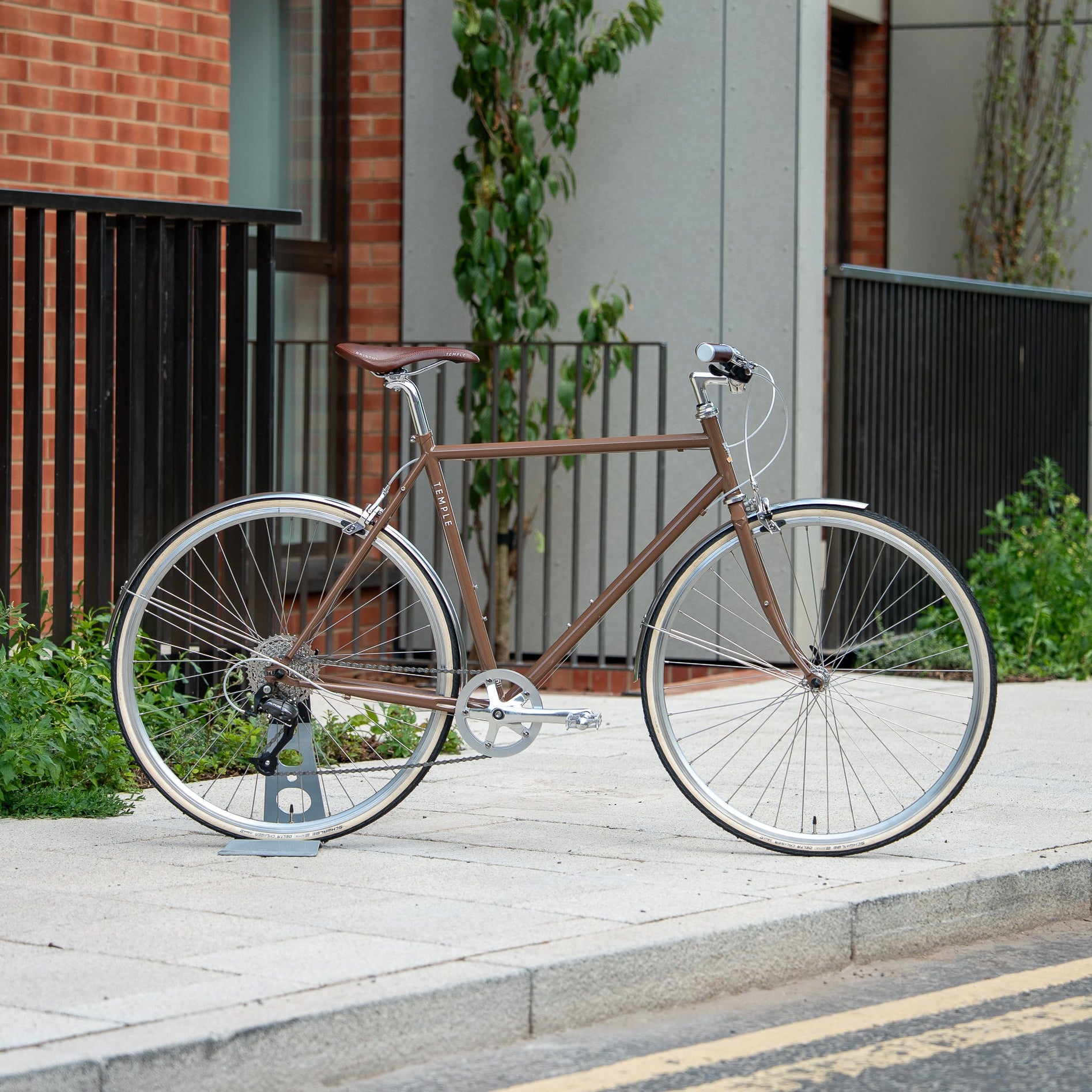 Woodland Brown Classic Lightweight bike in an urban setting.