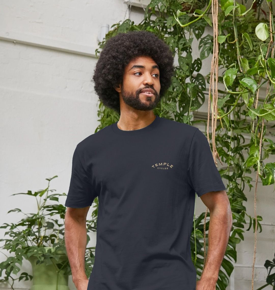 Extra soft base layer Tee on male model, urban setting. 