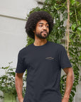 Extra soft base layer Tee on male model, urban setting. 