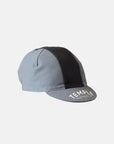 Grey and black striped cycling cap in a studio setting.