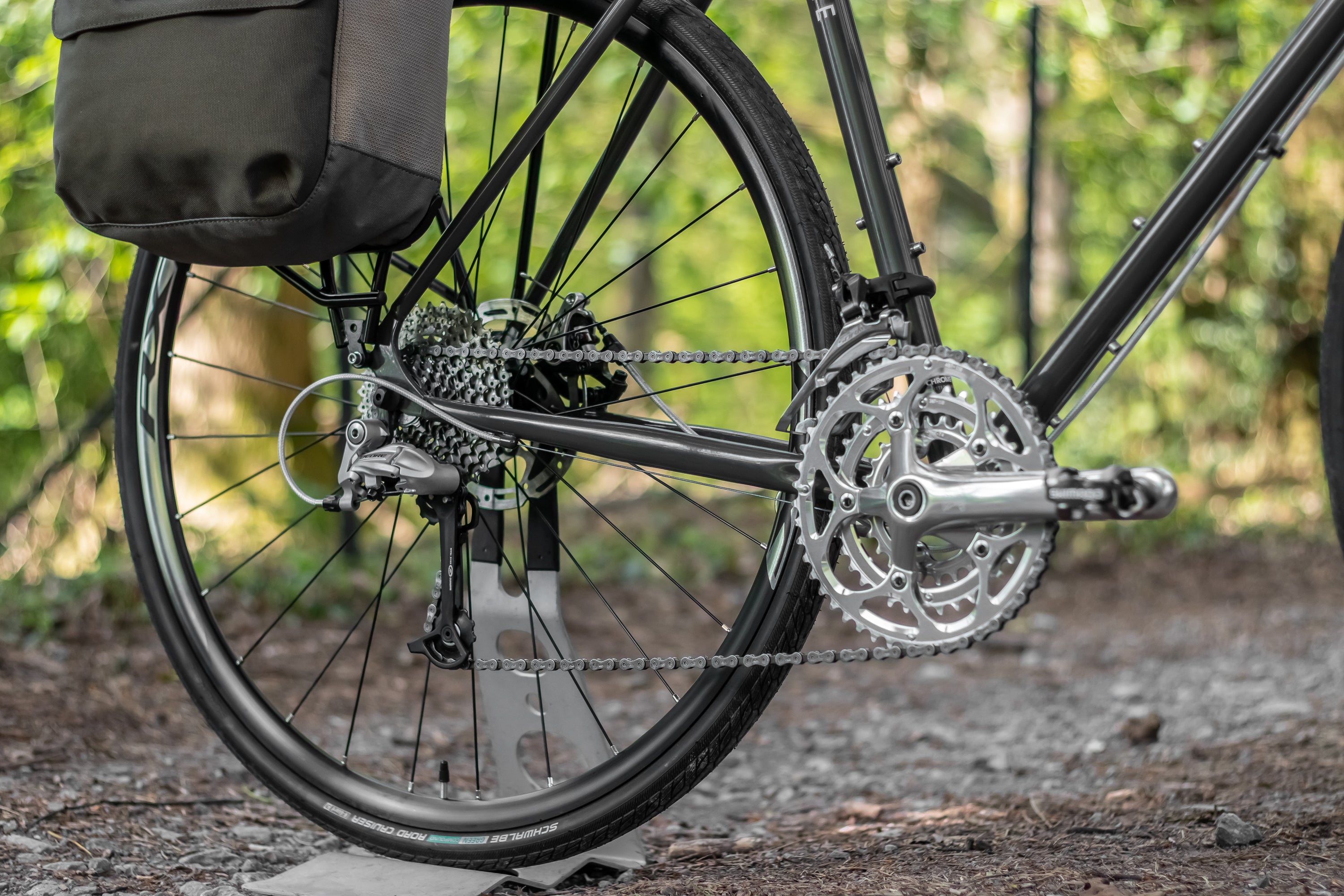 27gears, back wheel handmade by Hunt and Shimano 105 groupset on a gravel bike, nature setting.